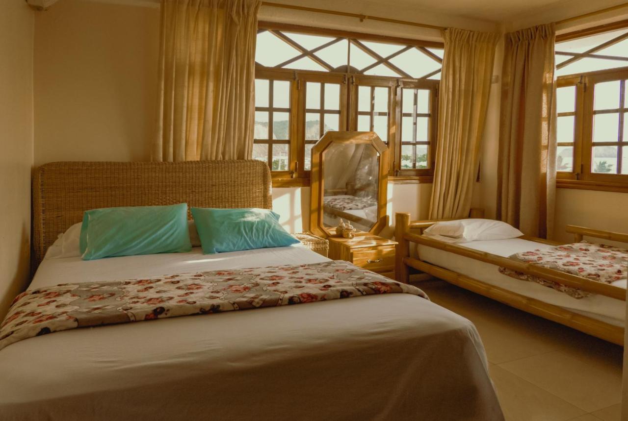 Hostal Poseidon Пуерто Кайо Екстериор снимка